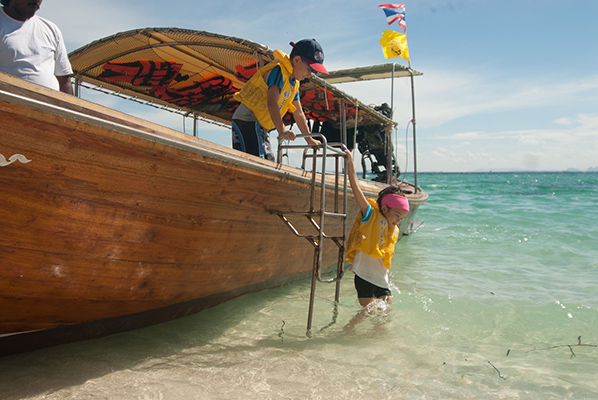 Arriving on a private longtail boat at Poda Island.